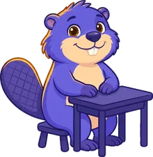 Tan sitting on a chair at a desk