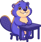 Tan sitting on a chair at a desk